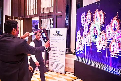 Digital slingshot game installation at an event