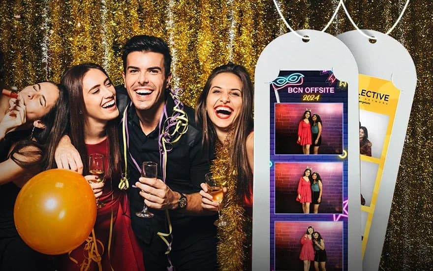 Guests laughing with props and photo strips at a Bilimbe booth